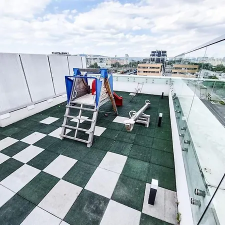 With Garage Parking And Communal Terrace